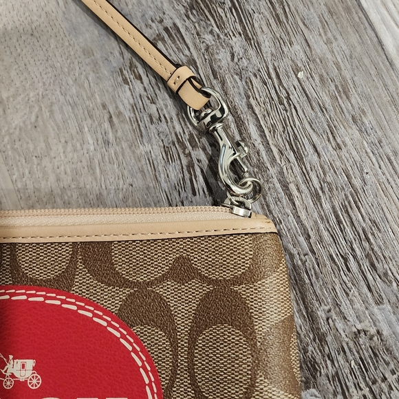 Coach Signature Horse & Carriage Wristlet - Picture 4 of 4